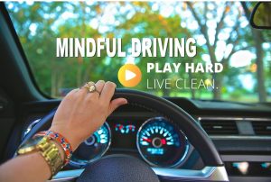 Mindful driving wording- PHLC logo hand on steering when looking out the windshield